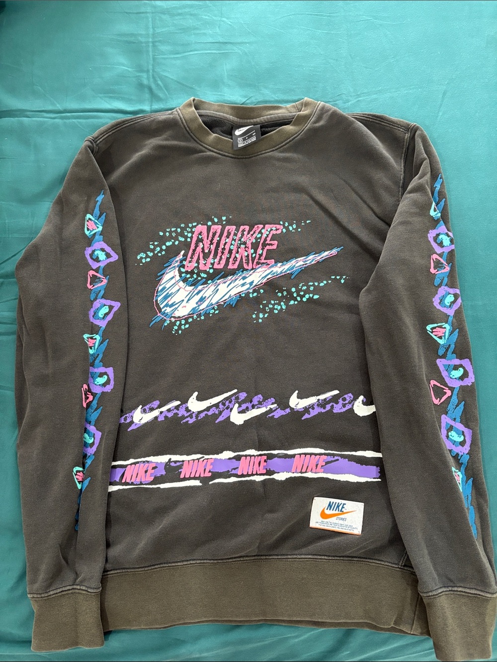 Nike Black Crewneck Sweatshirt with Multi‑Color Graphic Logos